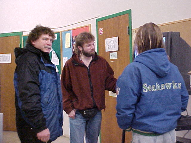 ECTV crew members review the show post-taping as it goes out on channel 29 in the Eugene area